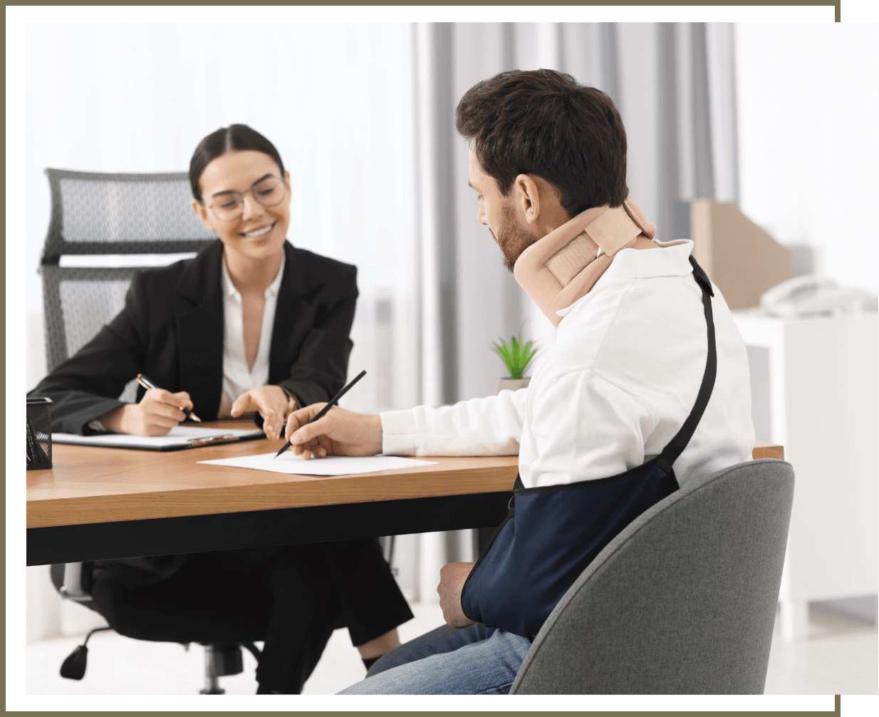 Man consulting a woman about neck pain in an office.